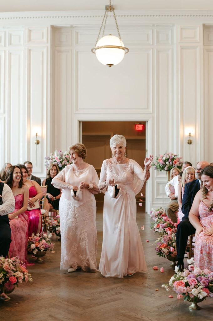 Wedding at the Adolphus Hotel with guests wearing pink